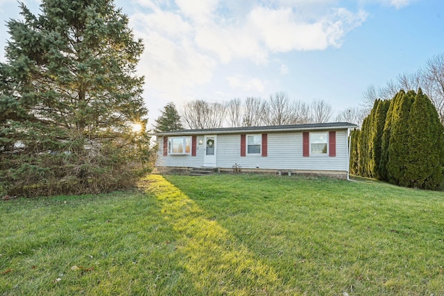 view of front of home with a front yard