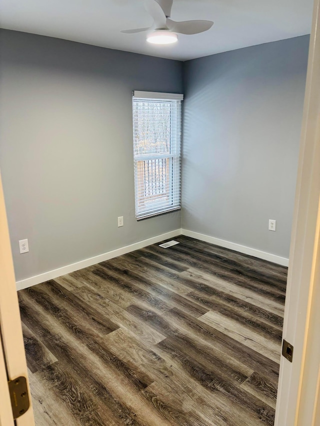 unfurnished room featuring ceiling fan and hardwood / wood-style floors