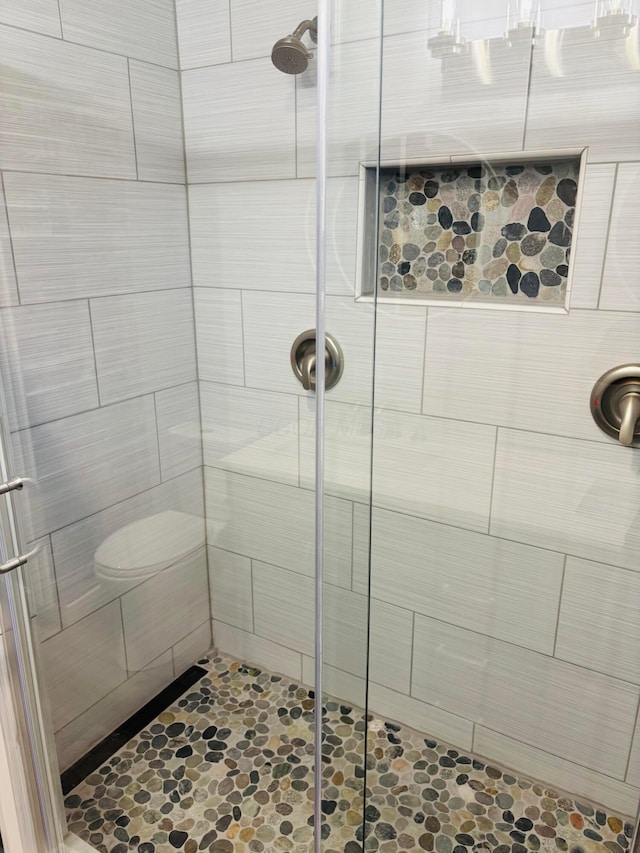 bathroom featuring walk in shower