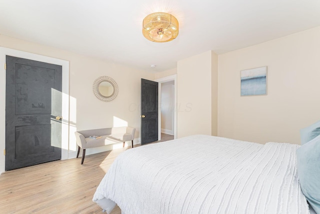 bedroom with light hardwood / wood-style flooring