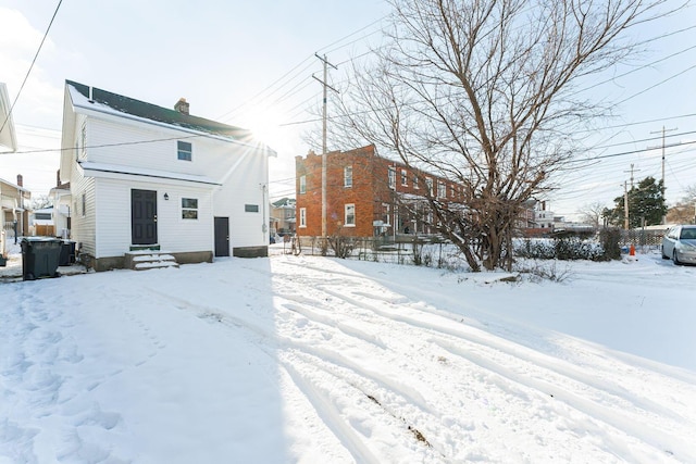 view of snow covered house