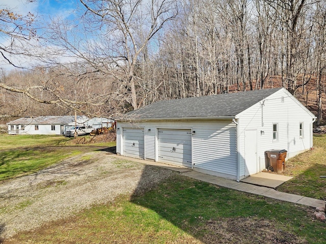 view of outdoor structure featuring a garage