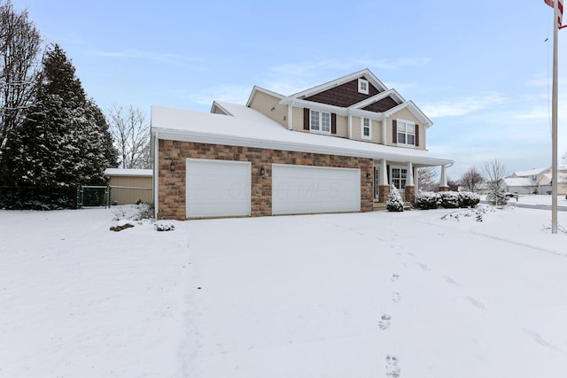 view of front of property with a garage