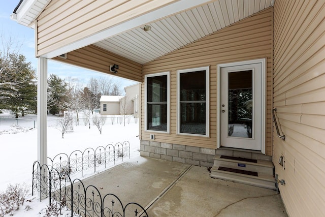 view of snow covered patio