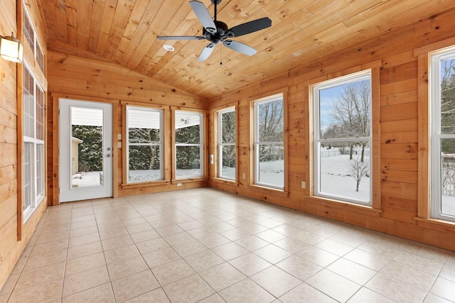 unfurnished sunroom with ceiling fan, wood ceiling, and vaulted ceiling