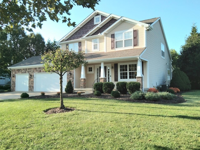 craftsman house with a porch, central AC, a garage, and a front lawn