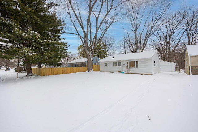 exterior space featuring an outdoor structure and a garage