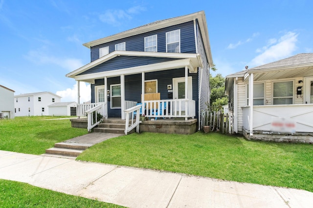 view of front of home featuring a porch and a front yard