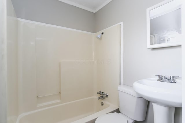 full bathroom featuring shower / tub combination, sink, and toilet