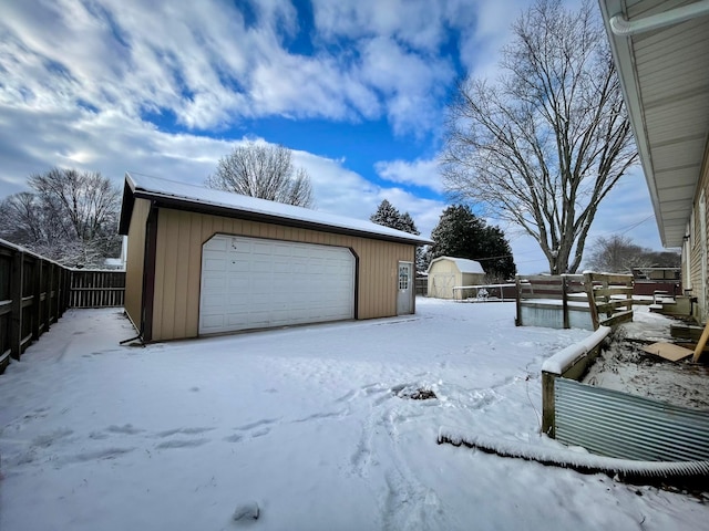 view of snow covered garage