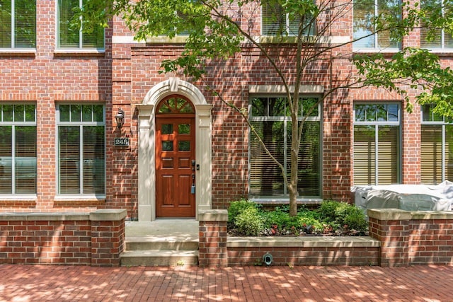 250 Daniel Burnham Sq Unit Th248, Columbus, OH 43215 - doorway to property featuring brick siding