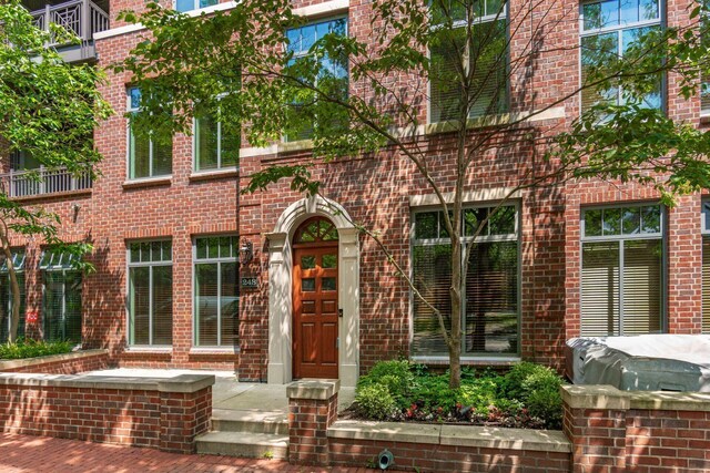 250 Daniel Burnham Sq Unit Th248, Columbus, OH 43215 - view of exterior entry with brick siding