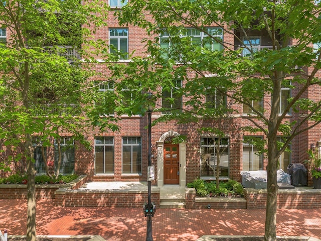 250 Daniel Burnham Sq Unit Th248, Columbus, OH 43215 - tudor-style house featuring brick siding