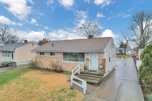 view of front of house with a front yard