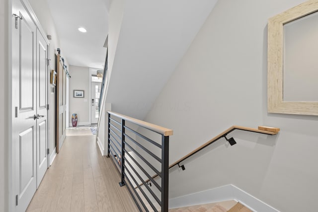 stairs with wood-type flooring