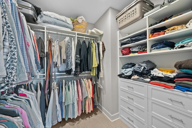 spacious closet with light wood-type flooring