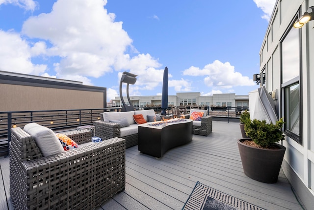 wooden deck featuring an outdoor living space