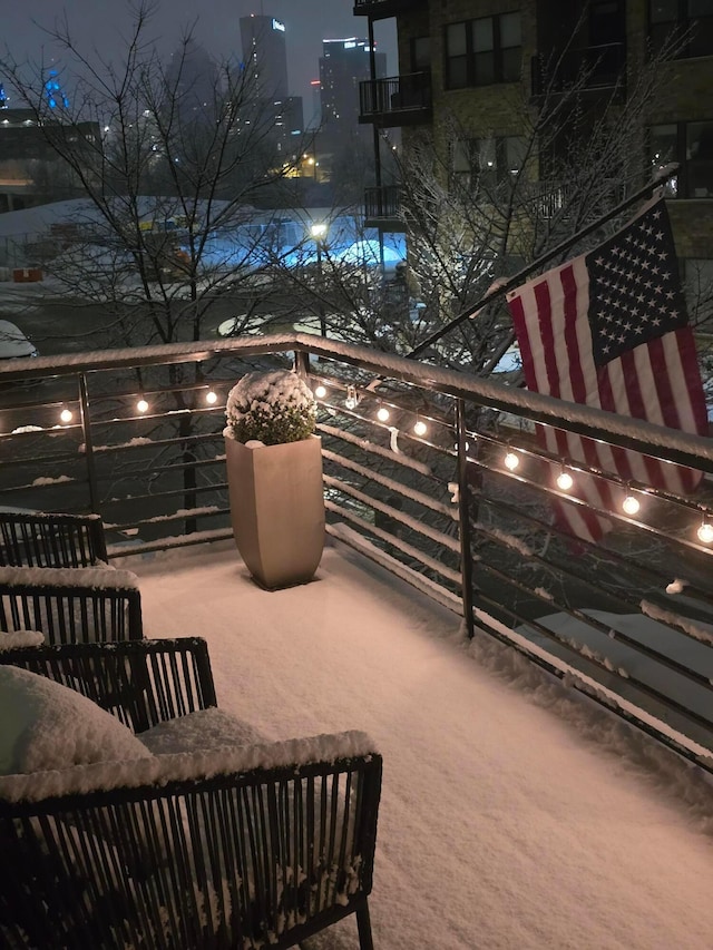 view of balcony at twilight