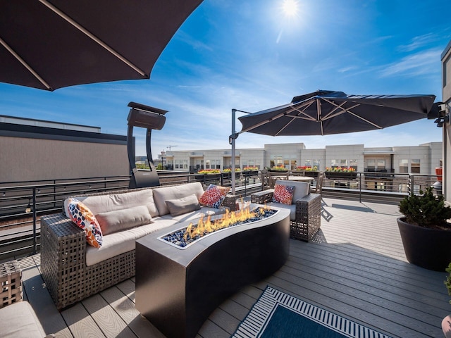 758 N 6th St, Columbus, OH 43215 - wooden deck featuring an outdoor fire pit