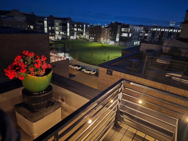 758 N 6th St, Columbus, OH 43215 - view of balcony at twilight