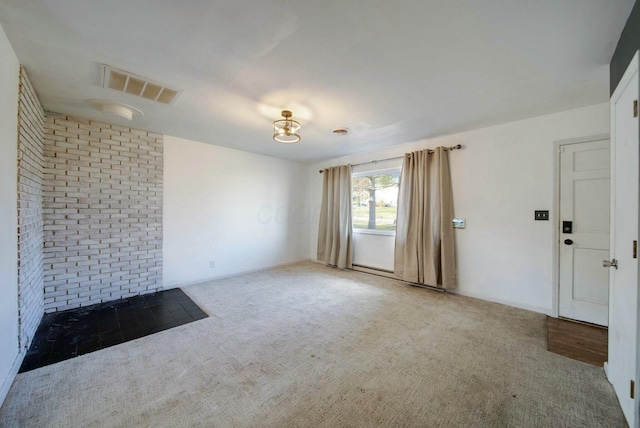 unfurnished room with carpet floors