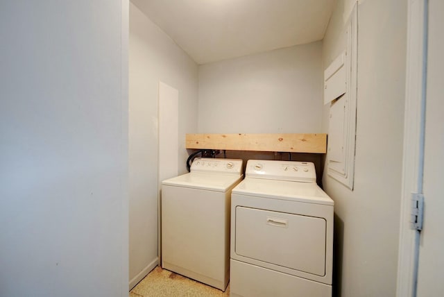 laundry area featuring washing machine and dryer