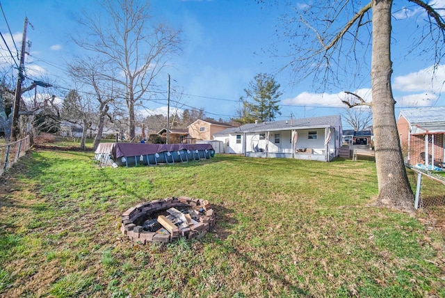 view of yard featuring a fire pit