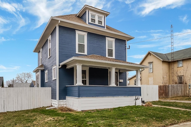 view of front of house with a front lawn and covered porch