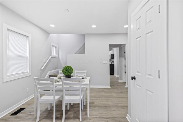 dining room featuring light wood-type flooring