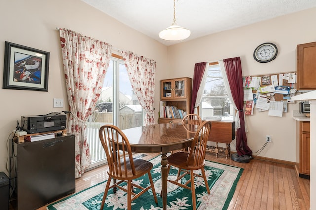 dining room featuring light wood-type flooring