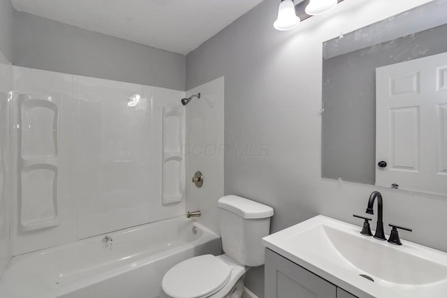 full bathroom with vanity, shower / bathtub combination, and toilet