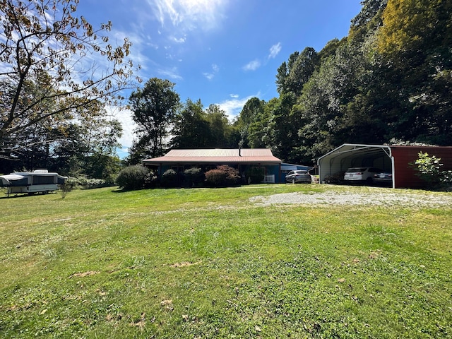 view of yard with a carport