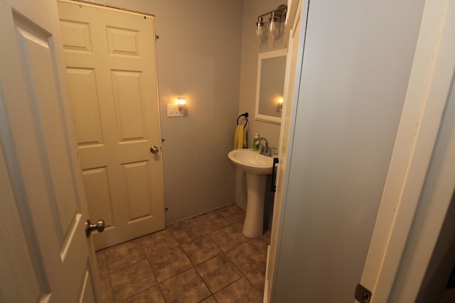 bathroom featuring tile patterned floors and sink