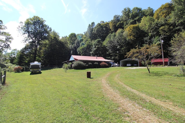 view of yard featuring a carport