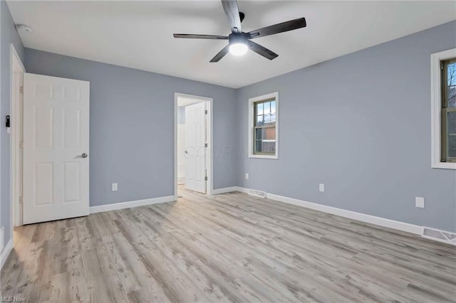 unfurnished bedroom with light hardwood / wood-style flooring and ceiling fan