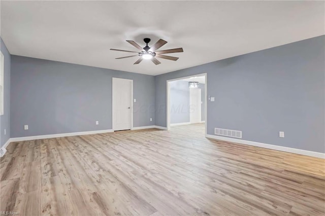 unfurnished room featuring ceiling fan and light hardwood / wood-style floors