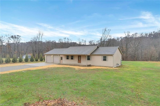 single story home with a front lawn, a porch, and a garage