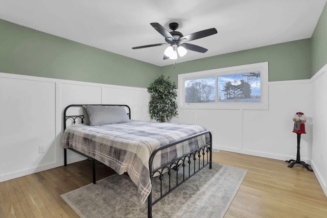 bedroom featuring ceiling fan and light wood-type flooring