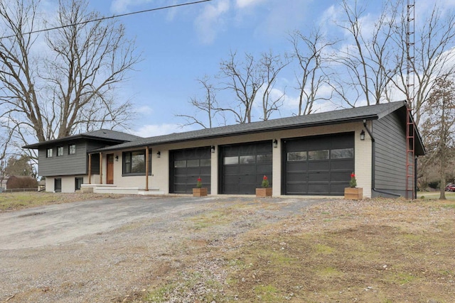 view of front of property with a garage