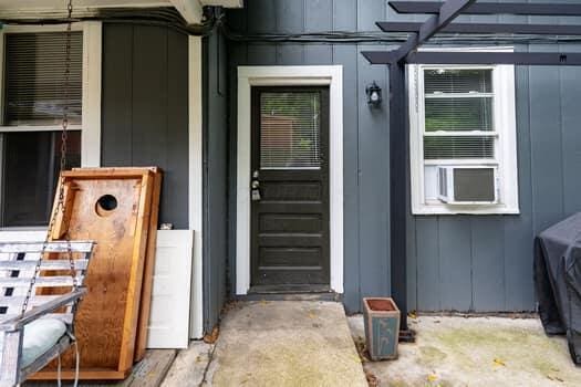 property entrance featuring cooling unit