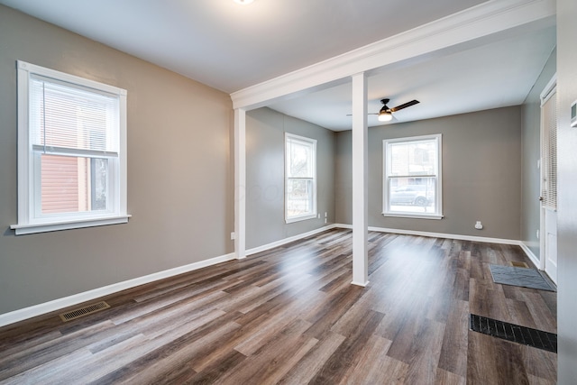 spare room with ceiling fan and wood-type flooring