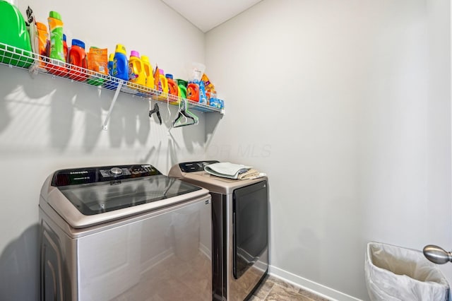 washroom featuring separate washer and dryer