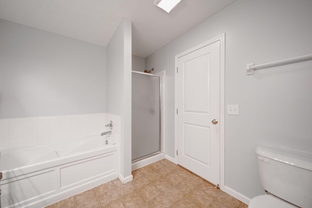 bathroom featuring shower with separate bathtub and toilet