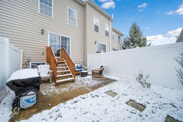 view of snow covered property