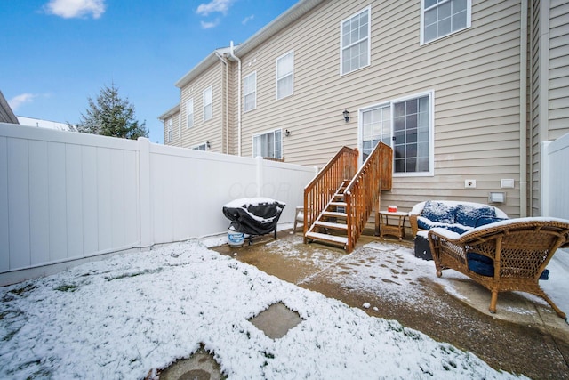 view of snow covered house