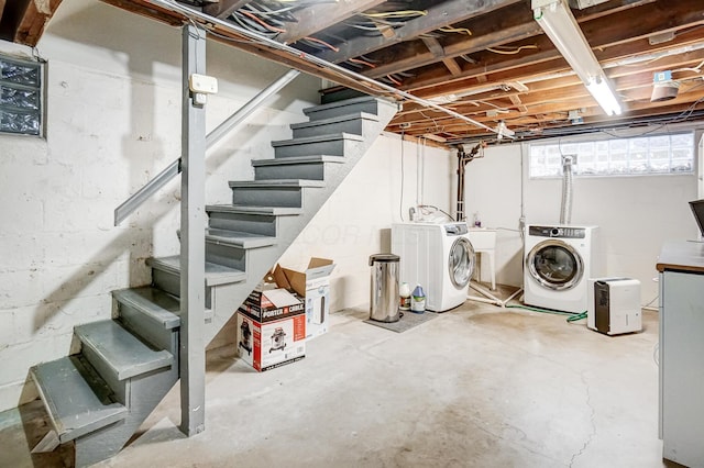 basement featuring independent washer and dryer