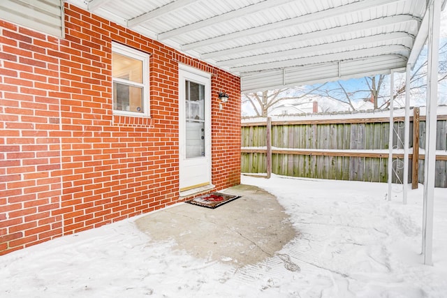 view of snow covered patio