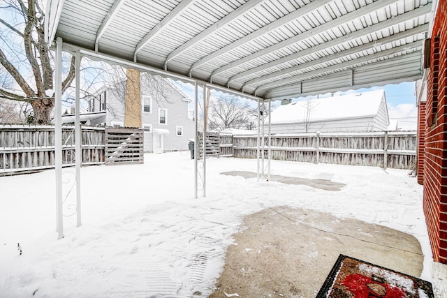 view of snow covered patio