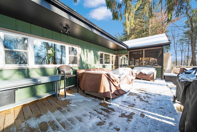 view of snow covered deck