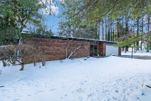 exterior space featuring a garage